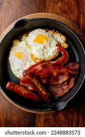 Breakfast. Bacon, Eggs and biscuits. Classical American diner or French Bistro brunch item favorite. Biscuits and White Gravy. Homemade white sausage gravy served with fried eggs and crispy bacon. 