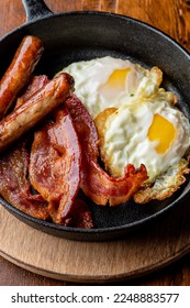 Breakfast. Bacon, Eggs and biscuits. Classical American diner or French Bistro brunch item favorite. Biscuits and White Gravy. Homemade white sausage gravy served with fried eggs and crispy bacon. 