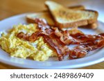 breakfast bacon scrambled eggs and toast 