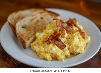 breakfast bacon scrambled eggs and toast  - Powered by Shutterstock