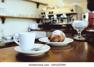 Breakfast At The Bar With Coffee And Brioches