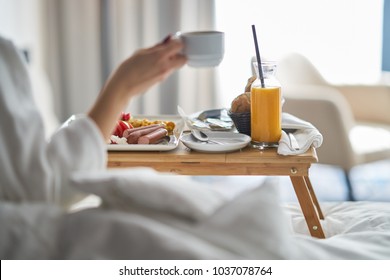 Breakfast in bed, cozy hotel room. concept