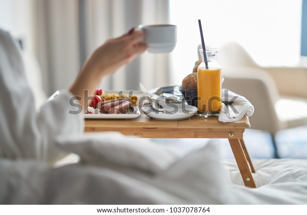 Breakfast in bed, cozy
hotel room. concept