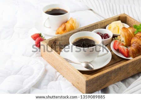 Similar – Hotcakes with fruit and coffee in bed