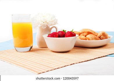 Breakfast with berries,orange juice and croissant, early breakfast - Powered by Shutterstock