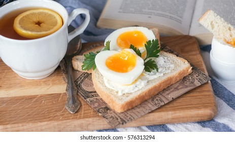 breakfast with boiled eggs and crispy toasts, closeup. - Powered by Shutterstock