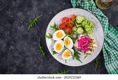 Breakfast. Boiled Eggs Salad With Greens, Cucumbers, Tomato And Sandwich With Ricotta Cheese, Fried Chicken Fillet And Red Onion. Top View, Overhead