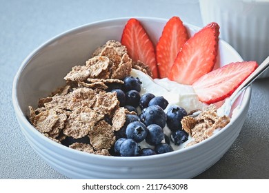 Breakfast Bowl With Greek Yoghurt, Blueberries, Strawberries And Full Corn Flakes.