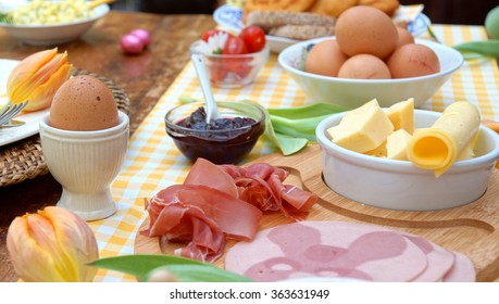 Breakfast Or Brunch Table Setting Full Of Healthy Ingredients For A Delicious Easter Meal With Friends And Family Around The Table 
