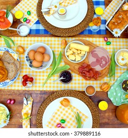 Breakfast Or Brunch Table Setting Full Of Healthy Ingredients For A Delicious Easter Meal With Friends And Family Around The Table 
