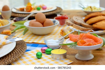 Breakfast Or Brunch Table Setting Full Of Healthy Ingredients For A Delicious Easter Meal With Friends And Family Around The Table
