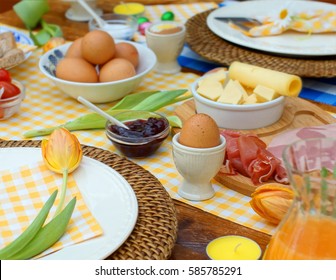 Breakfast Or Brunch Table Setting Full Of Healthy Ingredients For A Delicious Easter Meal With Friends And Family Around The Table
