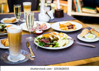Breakfast Buffet Concept, Breakfast Time in Luxury Hotel, Brunch with Family in Restaurant, Glass of Champagne with Tasty Food on a Plates