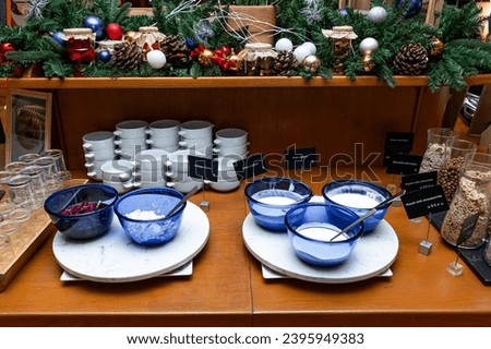 Breakfast Buffet with Selection of Yoghurts, Cereals, and Condiments