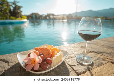 breakfast by the pool complemented by exquisite wine Stunning morning vista creating a perfect set