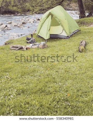 Similar – Image, Stock Photo Children’s feet and bottoms peek out of a gap in the tent