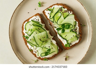 Breakfast, Cereal Bread Sandwiches, Cream Cheese, Sliced Cucumber, With Micro Greenery On A Light Table, Close-up, Top View, Selective Focus, No People,