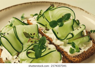 Breakfast, Cereal Bread Sandwiches, Cream Cheese, Sliced Cucumber, With Micro Greenery On A Light Table, Close-up, Top View, Selective Focus, No People,