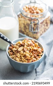 Breakfast Cereal Flakes In A Bowl On Kitchen Table.