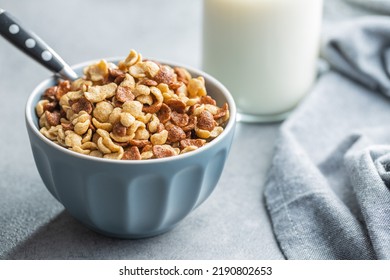 Breakfast Cereal Flakes In A Bowl On Kitchen Table.