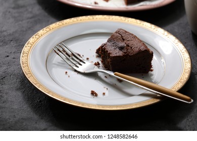 Breakfast of chocolate cake and bread