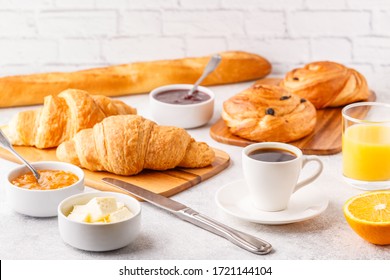 Breakfast with coffee and croissants, selective focus - Shutterstock ID 1721144104