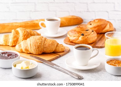 Breakfast with coffee and croissants, selective focus - Shutterstock ID 1750899041