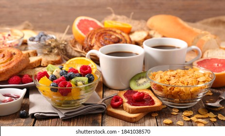 breakfast with coffee cup, fresh fruit, cereal and bread - Powered by Shutterstock