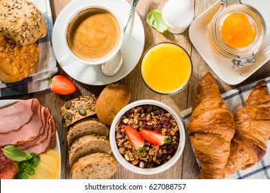 Breakfast Of Coffee, Juice, Muesli, Breads, Ham And Cheese - Top View
