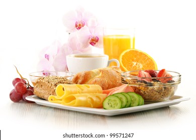 Breakfast With Coffee, Rolls, Egg, Orange Juice, Muesli And Cheese Isolated On White