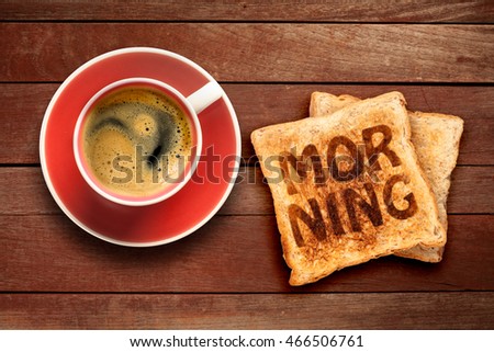 Breakfast, coffee and toast with a text morning, on a wood background