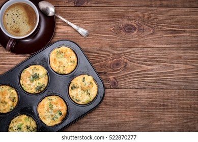 Breakfast Egg Muffins With Broccoli And Cheese. Cup Of Coffee.