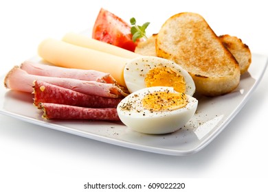 Breakfast - eggs, toast, ham and cheese 