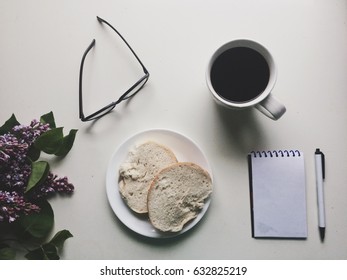 Breakfast flatlay with plain paper and copy space