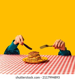 Breakfast. Food pop art photography. Female hand and sweet pancakes on plaid tablecloth isolated on bright yellow background. Vintage, retro 80s, 70s style. Complementary colors, Copy space for ad - Shutterstock ID 2117994893