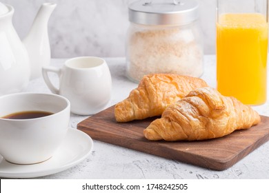 Breakfast With Fresh Croissants, Orange Juice And Coffee.