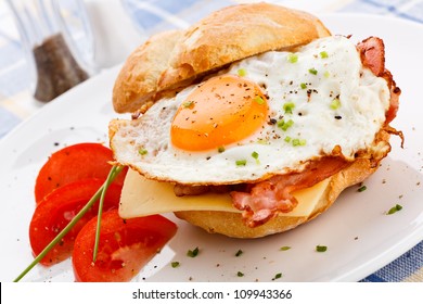 Breakfast - Fried Egg With Bacon And Cheese