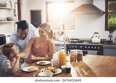 Breakfast, happy family and nutrition in kitchen for love, support and healthy meal in morning. Parents, kid and people at table for pancakes, brunch or wellness while together at home for bonding - Powered by Shutterstock