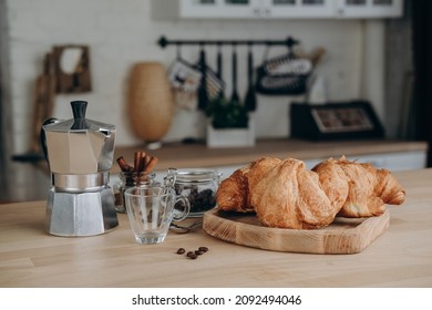 Breakfast At Home Fresh Espresso Coffee From The Classic Italian Geyser Coffee Maker Moka And Croissants On The Table