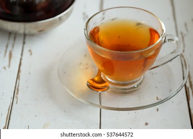 Breakfast, Hot tea on white wooden table and vintage background 