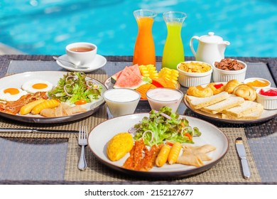 Breakfast In Hotel. Woman Hand Take A Piece Of Watermelon On Breakfast On Table With Beautiful Tropical View Of Blue Pool. Morning Food On Summer Romantic Vacation. Luxury Travel And Lifestyle