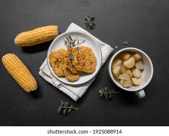 Breakfast Idea, Sweet Corn Fritters With Potatoes On Black Background