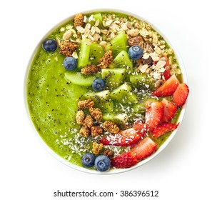 Breakfast Kiwi Smoothie Bowl Topped With Oat Flakes And Berries Isolated On White Background, Top View