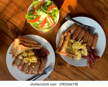 Breakfast Menu With Salads Bowl , Sausage And Egg