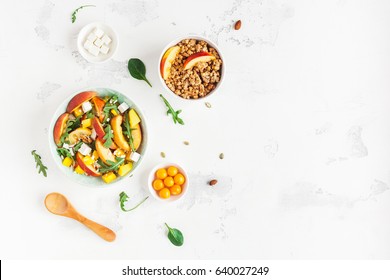 Breakfast With Muesli, Peach Salad, Fresh Peaches, On White Background. Healthy Food Concept. Flat Lay, Top View