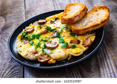 Breakfast - Omelette With Champignon On Wooden Background