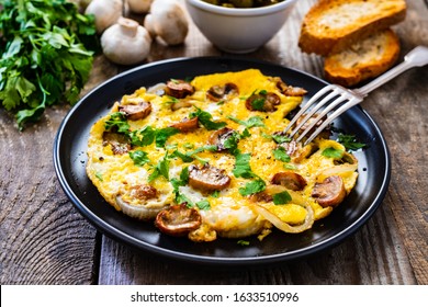 Breakfast - Omelette With Champignon On Wooden Background