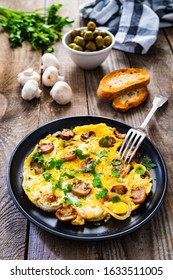 Breakfast - Omelette With Champignon On Wooden Background