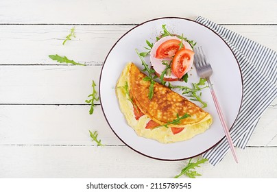 Breakfast. Omelette With Tomatoes, Cheese And Sandwich With Boiled Sausage.  Frittata - Italian Omelet. Top View, Overhead