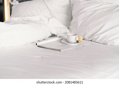 Breakfast on the bed in the hotel room. Breakfast in a snow-white bed, coffee with a croissant. Cozy morning. Breakfast in bed. - Shutterstock ID 2081483611
